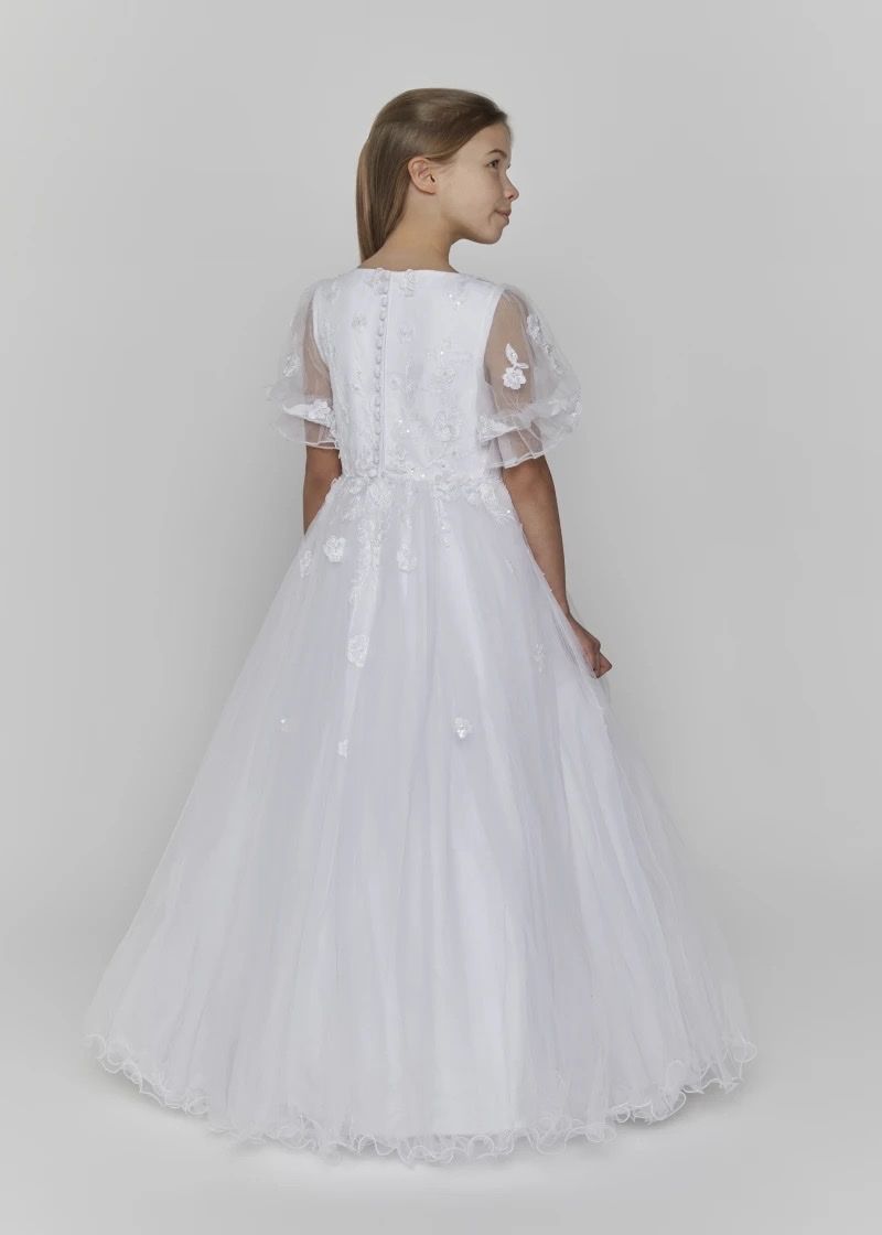 The back of the white communion dress, with buttons down the bodice and sheer floral sleeves